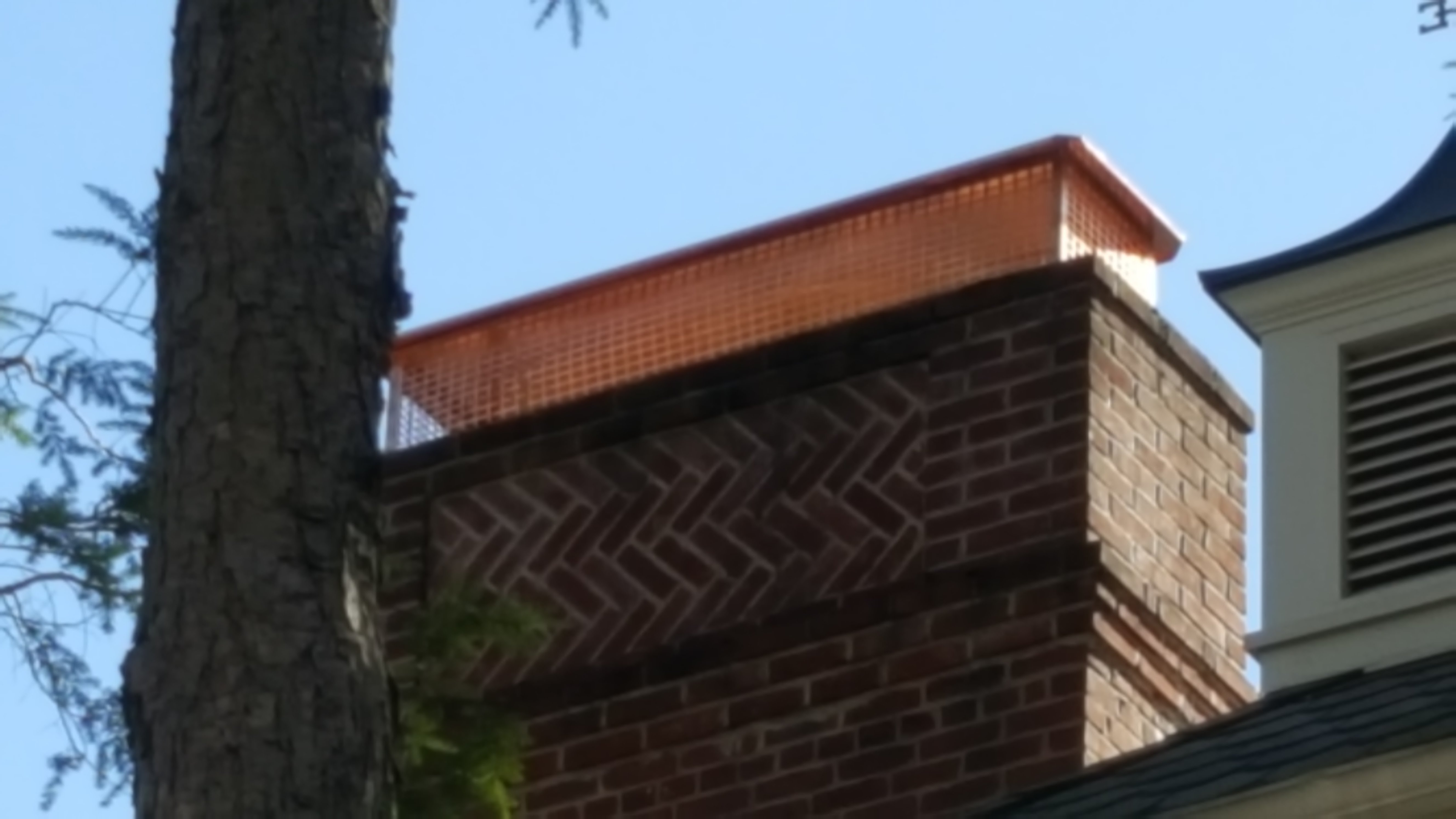 New stainless steel chimney cap installed in New Hyde Park, NY