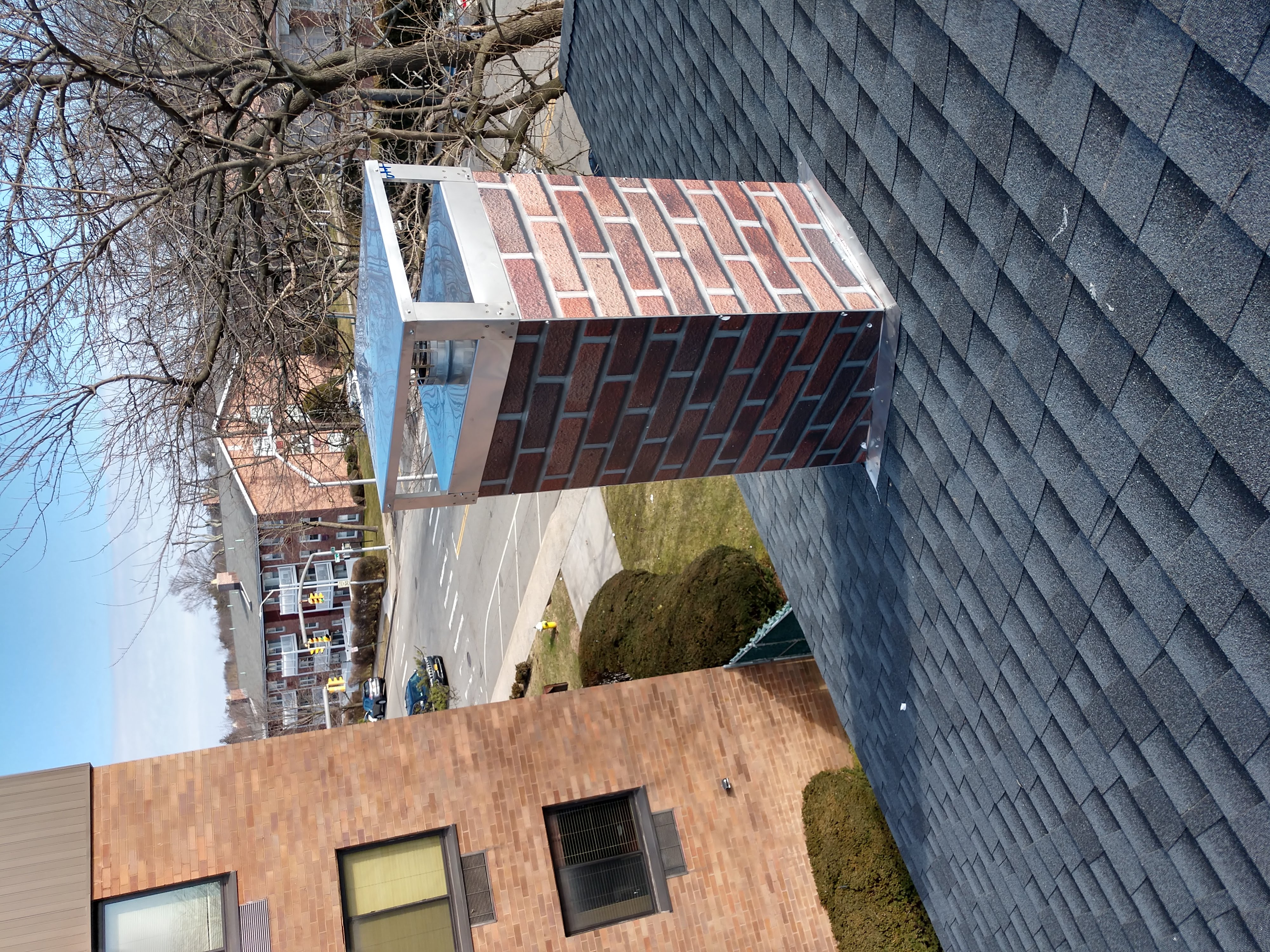 New elastomeric sealant applied to chimney crown in New Hyde Park, NY