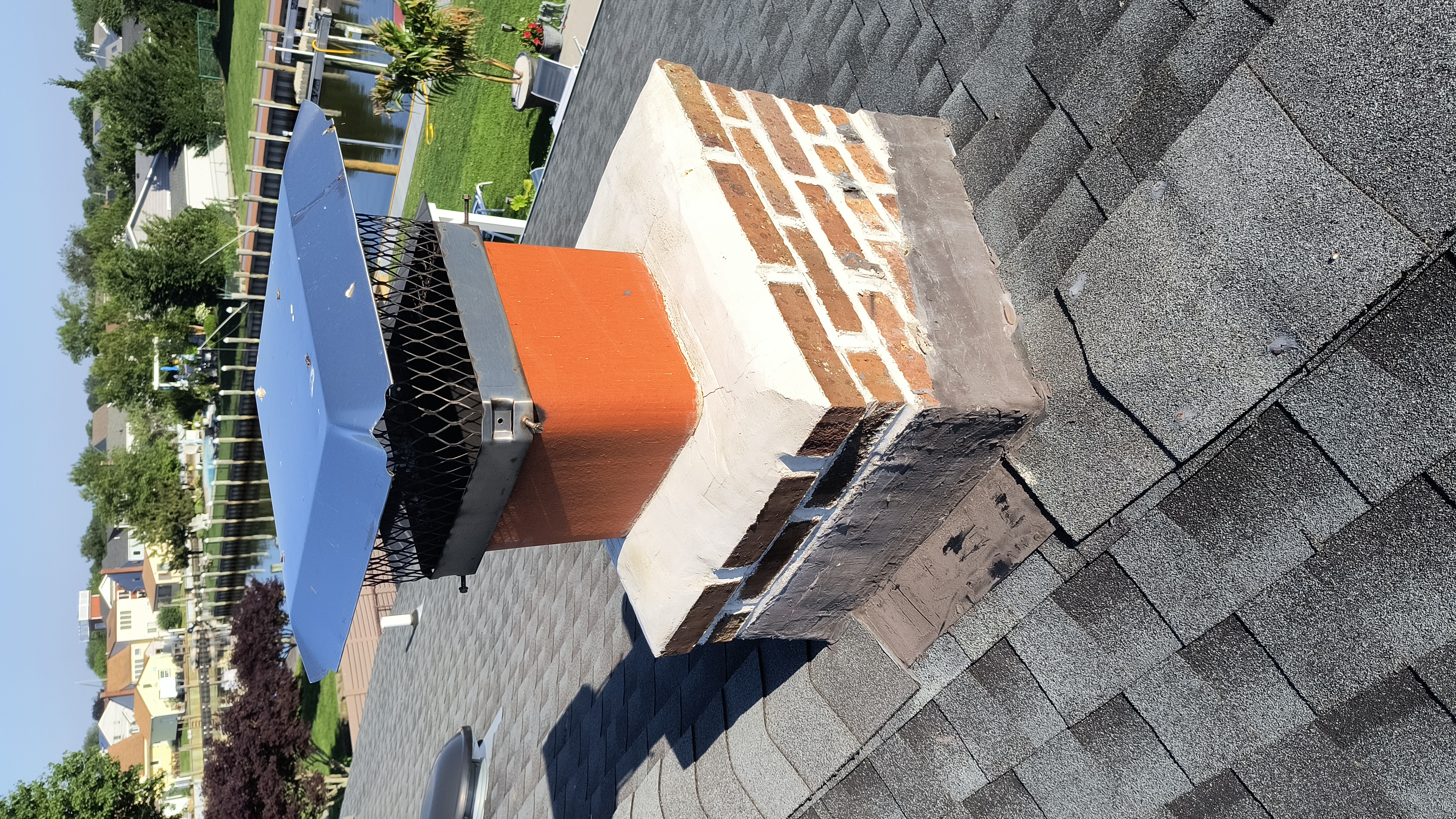 Full chimney masonry rebuild and restoration in New Hyde Park, NY